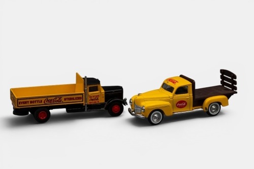 DODGE PETERBILT: A pair of loose models, one is a 1940 Dodge pick up made by Solido, also a Peterbilt 260 made by Hartoy, both models with Coca-Cola liveries