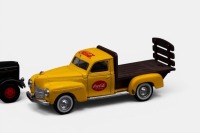 DODGE PETERBILT: A pair of loose models, one is a 1940 Dodge pick up made by Solido, also a Peterbilt 260 made by Hartoy, both models with Coca-Cola liveries - 2
