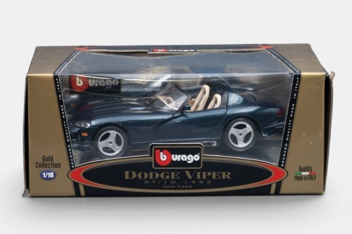 DODGE: A Bburago 1:18 scale 1993 Dodge Viper RT/10 model, finished in a dark blueish green paintwork with beige interior, part of the gold collection, model number 3365