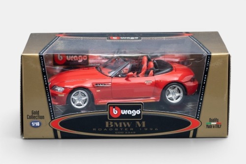 277 · BMW: A Bburago 1:18 scale 1996 BMW M roadster model, finished in red paintwork with red and black interior, part of the gold collection, model number 3349