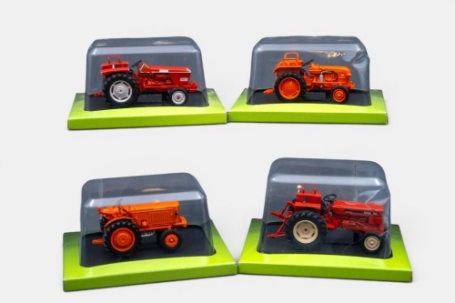 RENAULT TRACTORS: Four Hachette Partworks 1:43 scale Renault tractor models including 1950 R 3042, 1956 D22, 1968 56, 1973 551, all mounted onto black display bases, in original packaging