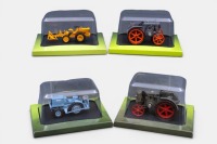 EUROPEAN TRACTORS: Four Hachette Partworks 1:43 scale European tractor models including 1934 SuperLandini, 1935 Landini Velite V.L. 30, 1954 Staub RT4, 1957 Bauche 'pousse-wagons', all mounted onto black display bases, in original packaging