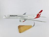 QANTAS BOEING 787: A 1:100 scale (44cm long) wooden model. - 2