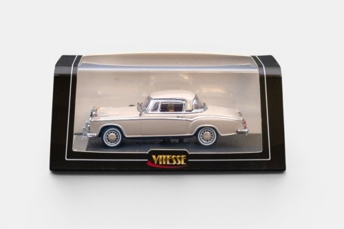 MERCEDES BENZ: A 1:43 scale Vitesse Mercedes Benz 220 SE coupe model, finished in cream paintwork, model number 28661