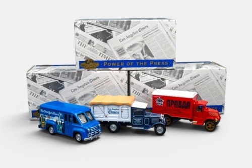 312 · DODGE FORD MACK: A trio of Matchbox models of yesteryear, a Dodge route van, a 1932 Ford AA truck, a 1920 Mack AC, all part of the power of the press series of models, the models are all in the original packaging