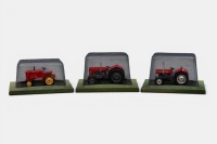 CANADIAN TRACTORS: Three Hachette Partworks 1:43 scale Canadian tractor models including 1957 Massey-Harris Pony 820, 1959 Massey Ferguson 65, 1965 Massey Ferguson 135