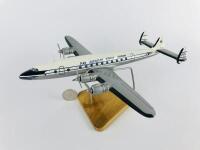 PAN AM SUPER CONSTELLATION: A 1:100 scale (28cm long) wooden model.