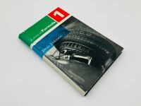 A STORY OF FORMULA 1: A hardcover book by Denis Jenkinson, signed by the author. - 2