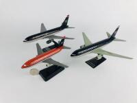 U.S AIRWAYS BOEING: Three models (longest 25cm): Two 1:200 scale Boeing 767-200, plastic models slightly different to each other and A 1:300 scale model Boeing 737-200 MetroJet plastic model.
