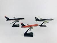 U.S AIRWAYS BOEING: Three models (longest 25cm): Two 1:200 scale Boeing 767-200, plastic models slightly different to each other and A 1:300 scale model Boeing 737-200 MetroJet plastic model. - 3