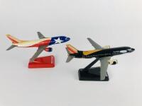 SOUTHWEST BOEING 737: Two 1:300 scale (18cm long) plastic Boeing 737-200 models. 'Shamu' Seaworld and 'Lone Star' Texas state. - 2