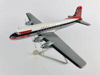 ANSETT DC4 CARGOMASTER: A 1: 50 scale (40cm long) wooden model, registration 'VH-ANF'.