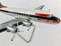 ANSETT DC4 CARGOMASTER: A 1: 50 scale (40cm long) wooden model, registration 'VH-ANF'. - 4