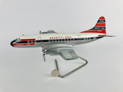 ANSETT LOCKHEED ELECTRA: A 1:50 scale (42cm long) wooden model, registration 'VH-RMA'.