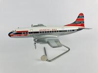 ANSETT LOCKHEED ELECTRA: A 1:50 scale (42cm long) wooden model, registration 'VH-RMA'.