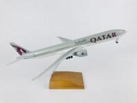 QATAR BOEING 777: A 1:100 scale (37cm long) resin model, with wheels on stand, registration 'A7-BAL'. - 2