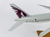 QATAR BOEING 777: A 1:100 scale (37cm long) resin model, with wheels on stand, registration 'A7-BAL'. - 3