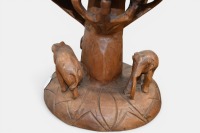 SIDE TABLES: Two solid timber carved side tables/stools featuring elephants, 48cm high, 39cm diameter - 2