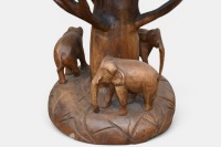 SIDE TABLES: Two solid timber carved side tables/stools featuring elephants, 48cm high, 39cm diameter - 4