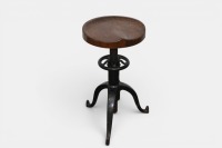 STOOL: An antique cast iron and wood stool by 'Satellite Adjustable Table Co, Grand Rapids Mich', 68cm high