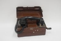 FIELD TELEPHONE: A WWI era field telephone with hand crank