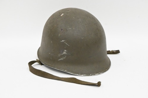 AUSTRIAN MILITARY: A circa 1960s Austrian M75 army helmet fitted with helmet liner