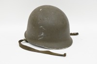 AUSTRIAN MILITARY: A circa 1960s Austrian M75 army helmet fitted with helmet liner
