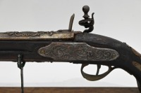 PISTOL: A reproduction flintlock pistol displayed on timber base, pistol 46cm long - 3
