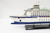 MODEL BOAT: A wooden model of the Royal Caribbean 'Explorer of the Seas' cruiseliner displayed on timber base, 40cm high overall, 80cm long - 4