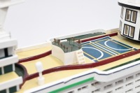 MODEL BOAT: A wooden model of the Royal Caribbean 'Explorer of the Seas' cruiseliner displayed on timber base, 40cm high overall, 80cm long - 6