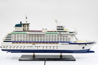 MODEL BOAT: A wooden model of the Royal Caribbean 'Explorer of the Seas' cruiseliner displayed on timber base, 40cm high overall, 80cm long - 7