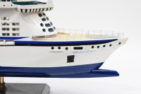 MODEL BOAT: A wooden model of the Royal Caribbean 'Explorer of the Seas' cruiseliner displayed on timber base, 40cm high overall, 80cm long - 8