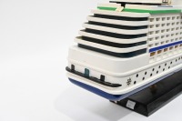 MODEL BOAT: A wooden model of the Royal Caribbean 'Explorer of the Seas' cruiseliner displayed on timber base, 40cm high overall, 80cm long - 9