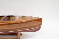 RIVA BOAT: A fine model Riva style boat on timber base, 18cm high, 62cm long - 3