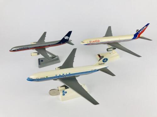 BOEING: Three models (24cm long): A 1:200 scale Varig Brasil Boeing 767 plastic model, registration 'PP-VNL', A 1:200 scale Lan Chile Boeing 767 plastic model, and A 1:200 scale Aero Mexico Boeing 757 plastic model, all on original branded stands.