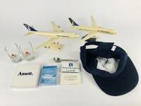 ANSETT: 9 items 1990's: A 1:200 scale (30cm long) Ansett Boeing 747 plastic model on stand, A 1:200 scale Ansett Boeing 777 plastic model on stand, one Ansett Australia wool, viscose cap, one Ansett teaspoon, one Ansett unused deck of playing cards, a se - 2
