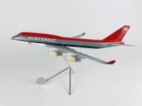 NORTHWEST BOEING 747: A 1:200 scale (35cm long) plastic model on metal stand.