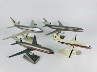 AMERICAN AIRLINES: 4 models (longest 32cm): A 1:150 scale MD11 'Luxury liner' plastic model, registration 'N1750B', A 1:200 MD11 'Luxury Liner' plastic model, A 1:200 scale Boeing 747 'Luxury Liner' plastic model, registration 'N602AA', and A 1:100 scale