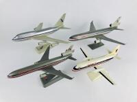 AMERICAN AIRLINES: 4 models (longest 32cm): A 1:150 scale MD11 'Luxury liner' plastic model, registration 'N1750B', A 1:200 MD11 'Luxury Liner' plastic model, A 1:200 scale Boeing 747 'Luxury Liner' plastic model, registration 'N602AA', and A 1:100 scale - 2