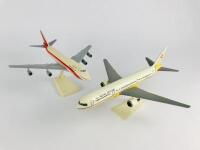 ANGOLA AND ROYAL BRUNEI AIRLINES: 2 models (longest 28cm): A 1:200 scale Angola Airlines 747-200 plastic model, registration 'D2-TEA' and A 1:200 scale Royal Brunei Boeing 767-300 plastic model. - 3