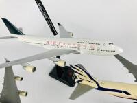 AIR CANADA: 4 Models (longest 36cm): A 1:150 scale Boeing 747-400 resin model. A 1:200 scale Boeing 747-400 plastic model. A 1:200 scale 'Canadian' plastic model and A 1:400 scale Boeing 777 metal model with wheels on stand. - 3