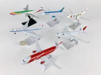 1:400 SCALE METAL MODELS: 6 models (all 16cm long): A 1:400 scale Air Asia A-320 metal model with wheels on stand, A 1:400 scale Uzbekistan Boeing 757-200 metal model with wheels on stand, A 1:400 scale China Eastern metal model, registration 'B6055', A 1
