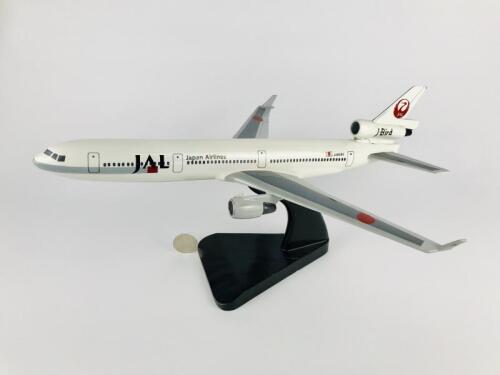 JAPAN AIRLINES MD11: A 1:50 scale (43cm long) wooden model, registration 'JA8580'.