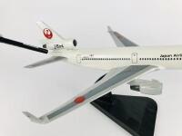 JAPAN AIRLINES MD11: A 1:50 scale (43cm long) wooden model, registration 'JA8580'. - 3