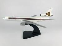 THAI INTERNATIONAL DOUGLAS DC 10: A 1:50 scale (44cm long) wooden model. - 2