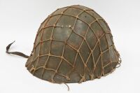 HELMET: A vintage military helmet, with interior leather strapping and exterior webbing - 2