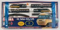 INTER-CITY 125: A circa early 1980s Lima Models Inter-City 125, OO gauge train set, includes two locomotives and two passenger cars, tracks and starter