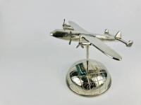 BOAC ART DECO DESK PIECE: A chrome plated articulating plane with spinnable propellors on a chrome half globe. - 3