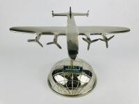 BOAC ART DECO DESK PIECE: A chrome plated articulating plane with spinnable propellors on a chrome half globe. - 4