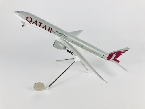 QATAR BOEING 777: A 1:100 scale (37cm long) resin model, with wheels on stand, registration 'A7-BAA'.